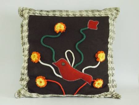 Handmade decorative pillow with bird